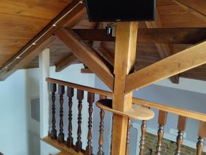 a flat screen tv on top of a wooden staircase at Residenza Degli Dei in Tropea
