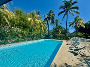 Πισίνα στο ή κοντά στο Villa Bois de sable avec piscine à la Saline les Bains