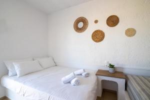 Postel nebo postele na pokoji v ubytování Hesperia Apartments by Estia