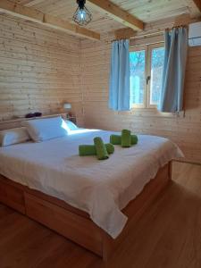 Postel nebo postele na pokoji v ubytování Gabrielin kutak