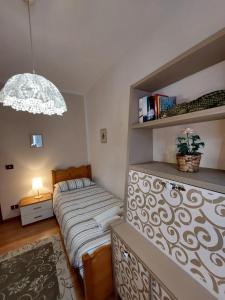 Postel nebo postele na pokoji v ubytování Appartamento panoramico