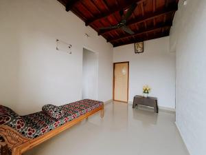 Una cama o camas en una habitación de Palkulam heights 18 fotos más