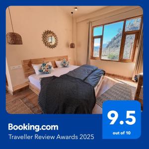 Postel nebo postele na pokoji v ubytování Grham Hostel & Cafe Kasol, Katagla