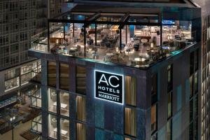 a sign on the side of a building at AC Hotel by Marriott Washington DC Capitol Hill Navy Yard in Washington