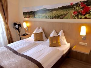 Katil atau katil-katil dalam bilik di Hotel Babenbergerhof