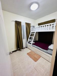 Postel nebo postele na pokoji v ubytování Prestige subd cabantian near Airport