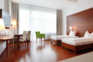 Katil atau katil-katil dalam bilik di Hotel Babenbergerhof