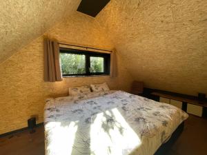 Postel nebo postele na pokoji v ubytování Chez Madeline