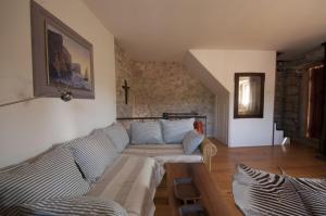 Posezení v ubytování Stone house Na Rudini