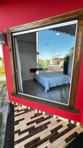 Postel nebo postele na pokoji v ubytování Pousada Recanto do Mar