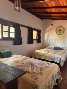 Postel nebo postele na pokoji v ubytování Pousada Arraial dos Sonhos + 37 fotografií
