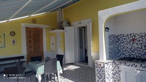 A seating area at Da Lucia - Alloggio turistico Santa Maria