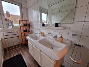 Koupelna v ubytování Gemütliche Ferienwohnung über 2 Etagen