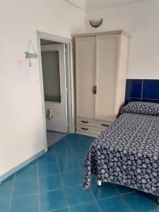 A bed or beds in a room at Da Lucia - Alloggio turistico Santa Maria
