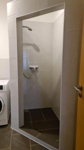 Koupelna v ubytování Ferienwohnung AM SPREEUFER + 8 fotografií