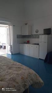 A kitchen or kitchenette at Da Lucia - Alloggio turistico Santa Maria