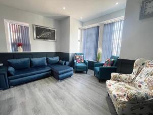 Et opholdsområde på Serenity Holiday Apartments