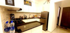 Kuchyň nebo kuchyňský kout v ubytování Colombo Flemington Apartments