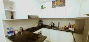 Kuchyň nebo kuchyňský kout v ubytování Colombo Flemington Apartments