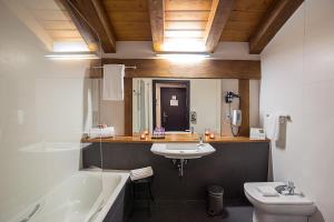 Koupelna v ubytování Hotel Dolarea