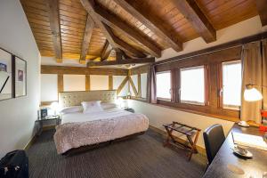 Postel nebo postele na pokoji v ubytování Hotel Dolarea