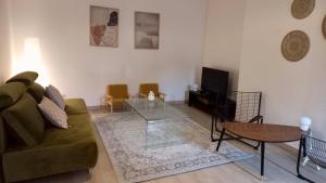 Posezení v ubytování Les suites de Saint-Yves + 5 fotografií