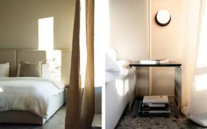 Postel nebo postele na pokoji v ubytování clea flims - modern alpine hideaway