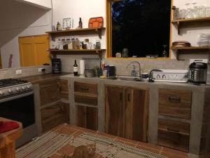 Kuchyň nebo kuchyňský kout v ubytování Casa gardenia cocles beach