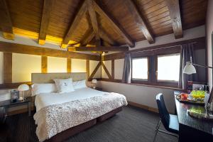 Postel nebo postele na pokoji v ubytování Hotel Dolarea