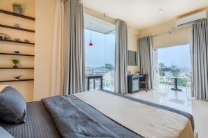 Postel nebo postele na pokoji v ubytování Mzion Hotel Weligama + 37 fotografií