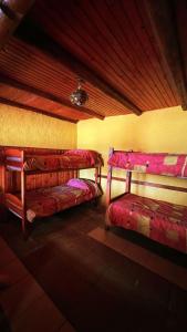 Postel nebo postele na pokoji v ubytování Hostal del Cabo + 8 fotografií