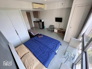Postel nebo postele na pokoji v ubytování 豪华公寓Unixx景观房22