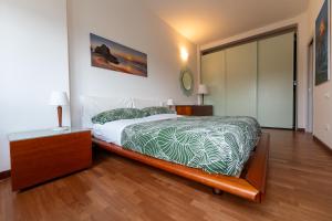 Postel nebo postele na pokoji v ubytování "Casa incantevole" fronte mare Pescara - Appartamento Via Buozzi