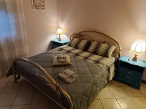 Postel nebo postele na pokoji v ubytování Alice Mercadini B&B
