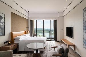 TV a/nebo společenská místnost v ubytování Sheraton Mianyang