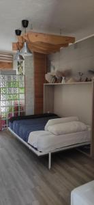 a bedroom with a large bed in a room at SALTILLO ALTO WHITE STUDIO in Torremolinos +63 photos