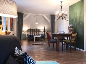 Posezení v ubytování Ferienwohnung im Loftstil
