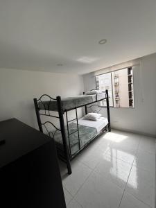 Postel nebo postele na pokoji v ubytování Apartamento de descanso Peñalisa Ricaurte