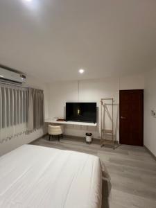 Postel nebo postele na pokoji v ubytování Hotel Nanon Sathorn