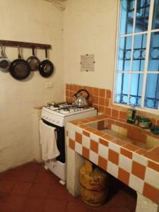 Η κουζίνα ή μικρή κουζίνα στο Casita d Playa 1