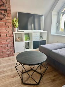 TV a/nebo společenská místnost v ubytování Apartament Ster