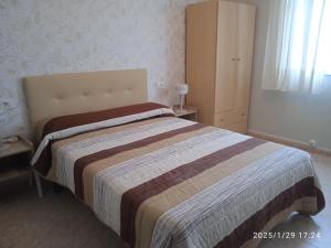 Posteľ alebo postele v izbe v ubytovaní Pitis