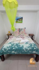 Postel nebo postele na pokoji v ubytování Villa Alizée Domaine roses des vents