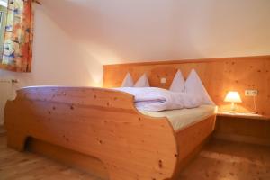 Postel nebo postele na pokoji v ubytování Stablerhof