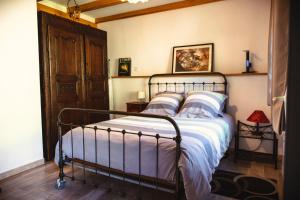 Postel nebo postele na pokoji v ubytování maison de la salamandre