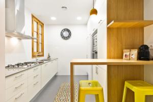 Kuchyňa alebo kuchynka v ubytovaní Central Apartments Barcelona