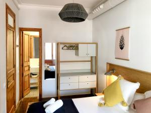 Posteľ alebo postele v izbe v ubytovaní Central Apartments Barcelona