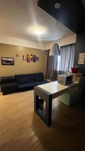 Posezení v ubytování FLAT NO CORAÇÃO De ALPHAVILLE