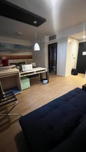 Posezení v ubytování FLAT NO CORAÇÃO De ALPHAVILLE