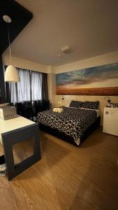 Postel nebo postele na pokoji v ubytování FLAT NO CORAÇÃO De ALPHAVILLE